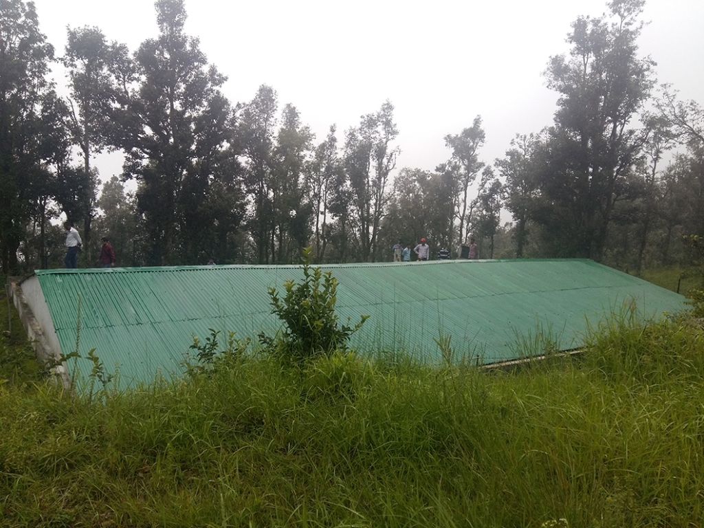 This rainwater harvesting tank on the hilltop above Nag village stores almost 400,000 litres